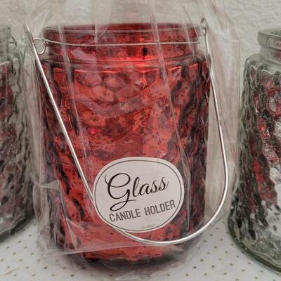 Lot 296: (4) New and Pre Owned Fancy Glass Candle Holders