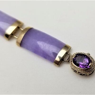 Lot #72  Polished  purple stone bracelet set in 14kt gold
