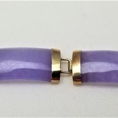 Lot #72  Polished  purple stone bracelet set in 14kt gold