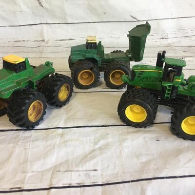 3  Deere tractors 