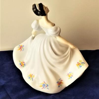 Lot #97  Royal Doulton "Kate" figurine