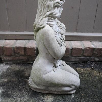 Lot #261: Kneeling Nude Woman Holding Flowers Cement Statue 