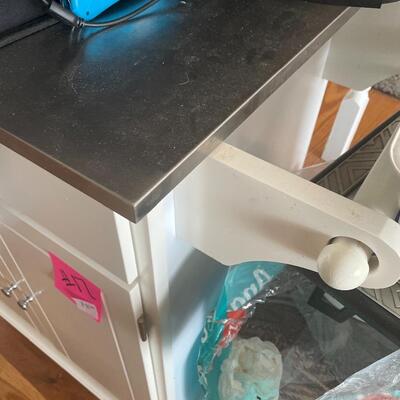Kitchen island with stainless top