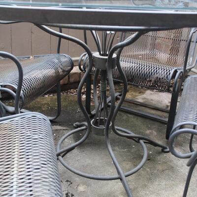 Lot #263: Vintage Wrought Iron Patio Set with Bouncing Rockers 