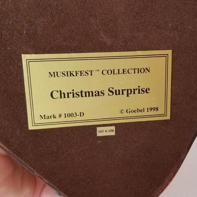 Lot #105  HUMMEL Christmas Surprise - 1998