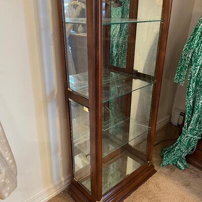 #611 Walnut Curio Cabinet- mirrored back and both sides open. 