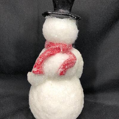 Snowman candle, approximately 9 inches tall