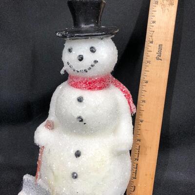 Snowman candle, approximately 9 inches tall