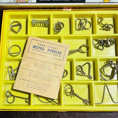 Lot 449  Vintage Puzzle Toys World Map Puzzle & Metal Puzzles