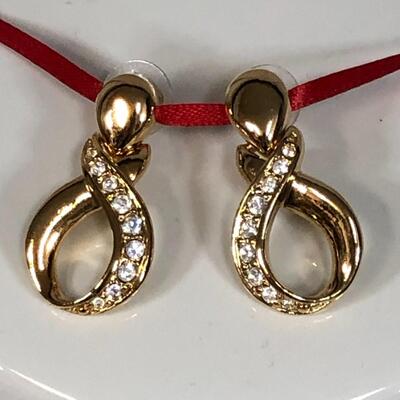 Lot 7 - Gold Tone Infinity Necklace and Earrings