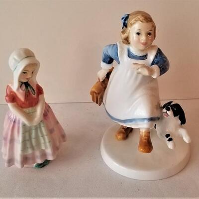Lot #145  Two Smaller Royal Doulton Figurines