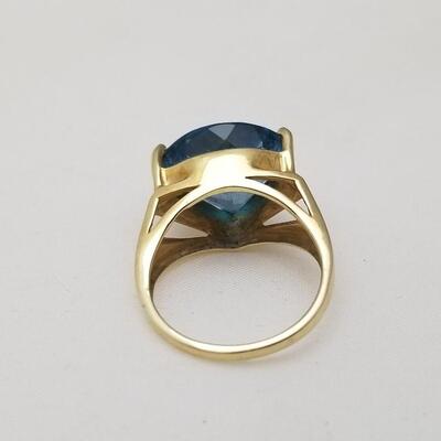 Lot #184  Beautiful Contemporary 14kt yellow gold/Topaz ring