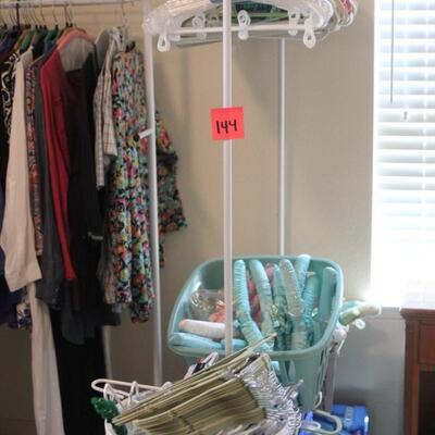 Lot 144 Clothing Rack w/ Bins of Hangers