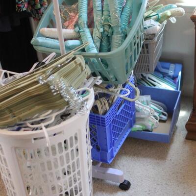Lot 144 Clothing Rack w/ Bins of Hangers