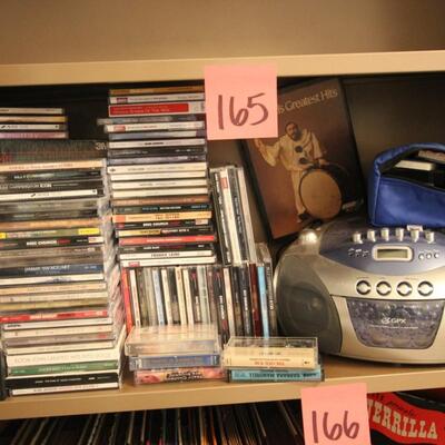 Lot 165 CDs & Tapes w/ Player