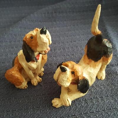 Pair of Tom Wolfe Carved Dogs