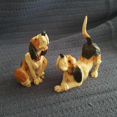 Pair of Tom Wolfe Carved Dogs