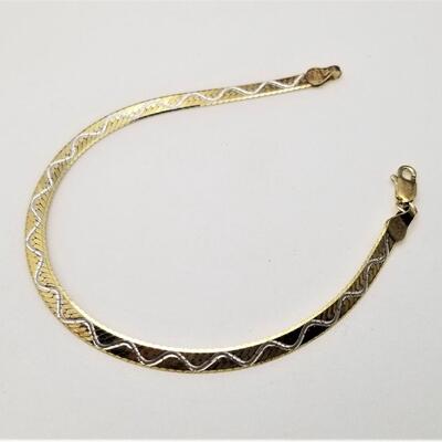 Lot #214  14kt Yellow & White Gold Herringbone Bracelet