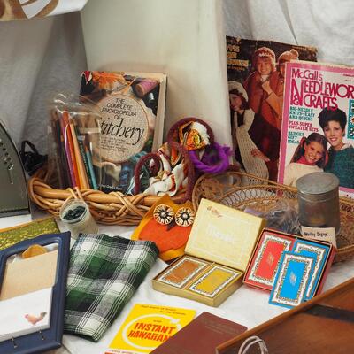 lot 82 Iron and table ironing board, stitchery book, Bridge cards vintage