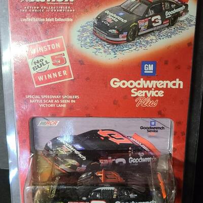 Lot 153: Nascar Collectibles: Warner Bros, Goodwrench and More