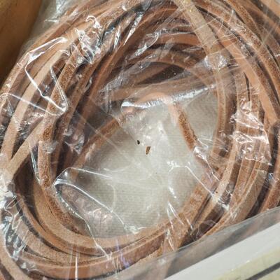 lot 91 Leather scraps and basketry materials