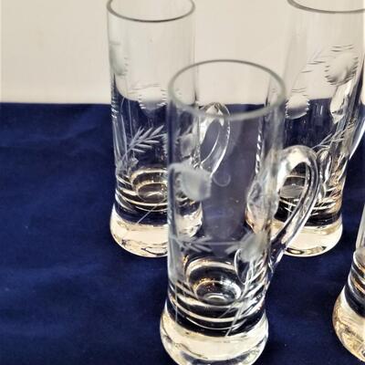 Lot #237  Set of 9 Etched Crystal Liquor Glasses