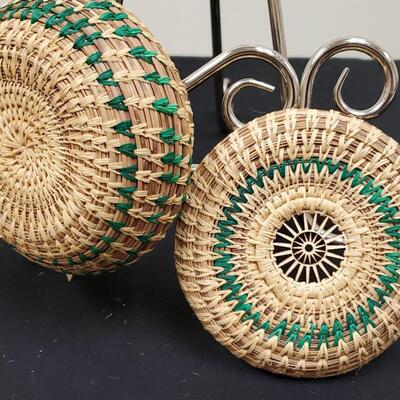 Brown Pine Needle Lidded Basket with green accent by Linda Havens