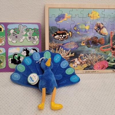 Lot 45: New Hallmark GREAT KID Plush Figure + Children's Puzzles 