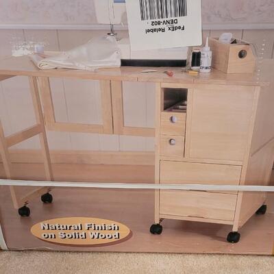 Lot 56: New in Box Portable Sewing and Crafting Table 