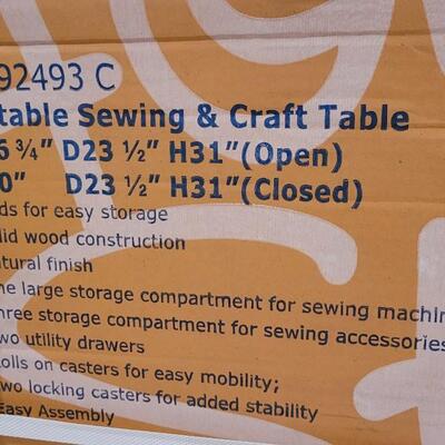 Lot 56: New in Box Portable Sewing and Crafting Table 