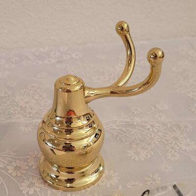 Lot 73: Moen Polished Brass Robe Hook