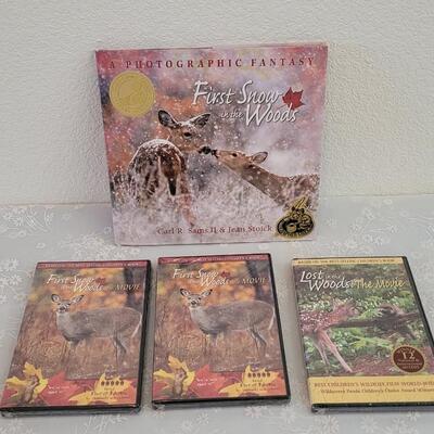 Lot 77: First Snow in the Woods Book, (2) DVDs and DVD Lost in the Woods 