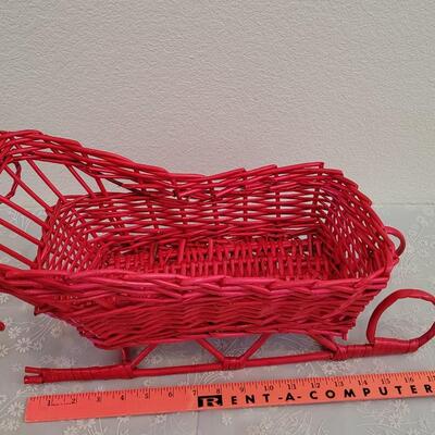 Lot 79: Vintage Red Wicker Sleigh and Santa Tree Face