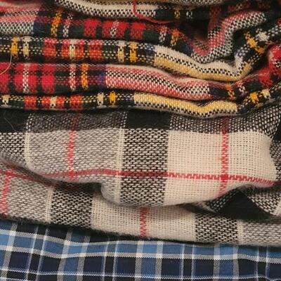 Lot 98: Mixed Polyester and Flannel Fabric (Polyester and Cotton Plaid -more than 5 yards, Flannels around 2 yards))