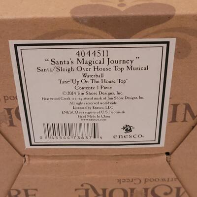 Lot 115: Jim Shore "Santa's Magical Journey" Snow Globe