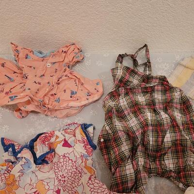 Lot 141: Vintage Doll Clothes (14
