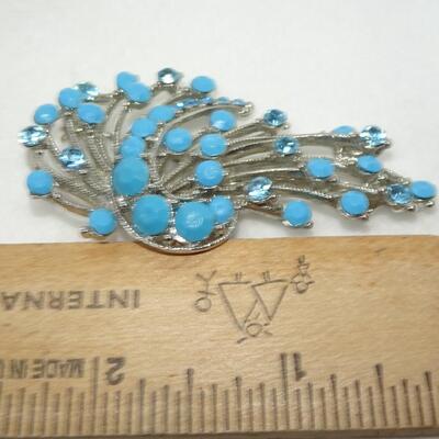 Mid Century Teal Glass & Rhinestone Silver Tone Swirl Brooch 