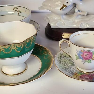 Lot 148: Collectibles, Teacups, and Home Decor