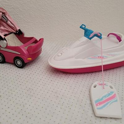 Lot 190: Vintage BARBIE Jet Ski and Stroller