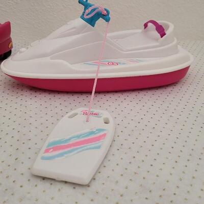 Lot 190: Vintage BARBIE Jet Ski and Stroller