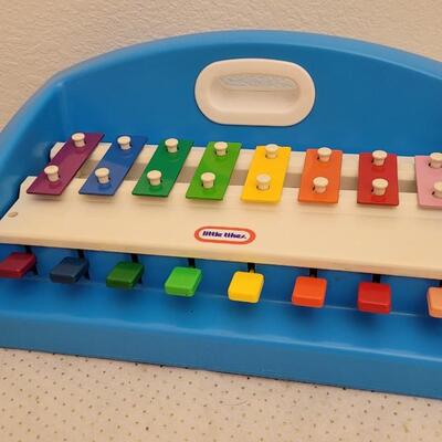 Lot 197: Vintage LITTTLE TIKES Childrens Finger Bell Set