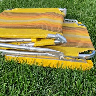 Lot 200: Vintage Yellow Striped Folding Lounge Chair 