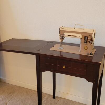 Lot 234: Vintage Singer 301A in Sewing Cabinet 