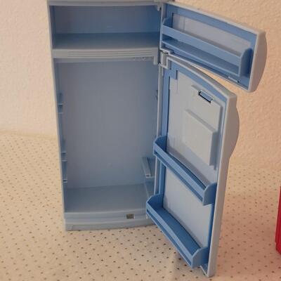 Lot 255: Vintage Barbie Kitchen Island with Stove and Refrigerator 