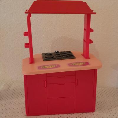 Lot 255: Vintage Barbie Kitchen Island with Stove and Refrigerator 