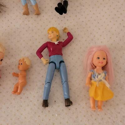 Lot 262: Mini Dolls with Bag