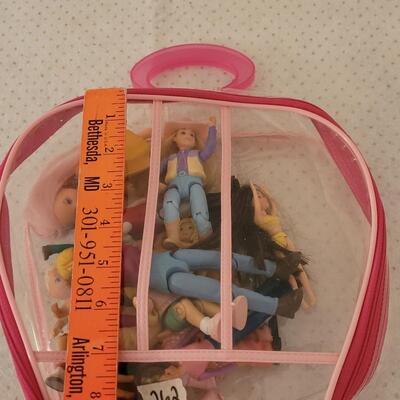 Lot 262: Mini Dolls with Bag