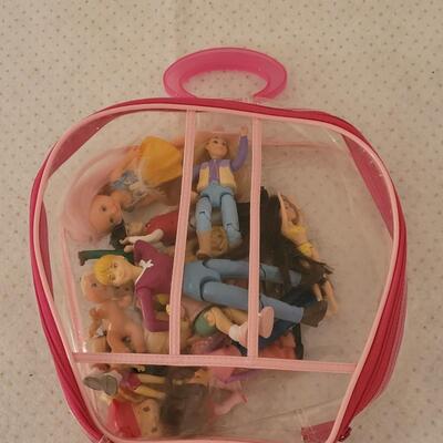 Lot 262: Mini Dolls with Bag
