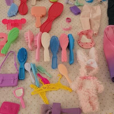 Lot 264: Vintage Barbie Clothes, Brushes, Hangers, Jewelry, Purses, Accessories & Shoes (have not matched them up)