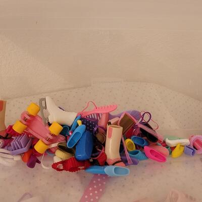 Lot 264: Vintage Barbie Clothes, Brushes, Hangers, Jewelry, Purses, Accessories & Shoes (have not matched them up)